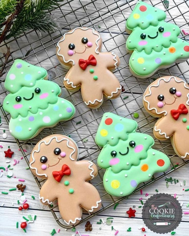 Whimsical Festive Cookie Decorations Featuring Cheerful Gingerbread Men and Vibrant Christmas Trees Celebrate Holiday Spirit.