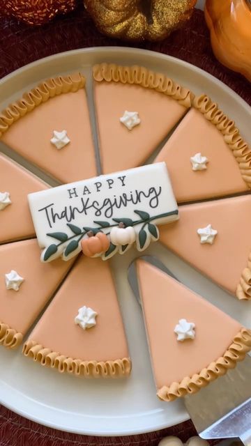 Elegant Thanksgiving Dessert Platter with Intricately Decorated Pie Slices.