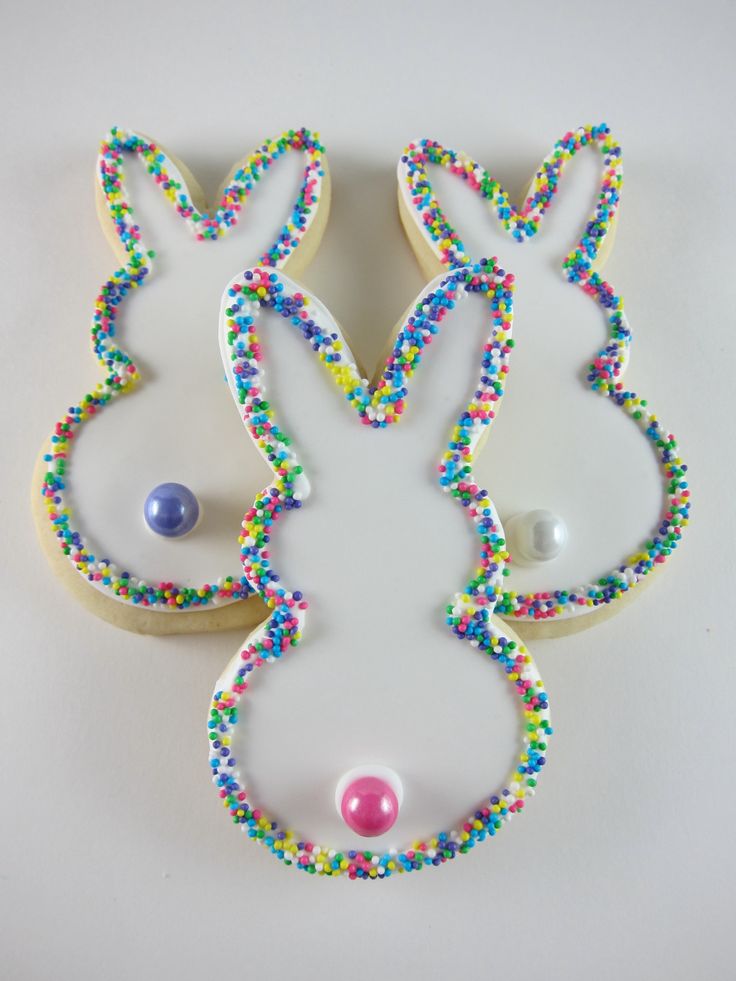 Playful Bunny-Shaped Cookies Adorned with Vibrant Sprinkles and Whimsical Beads.