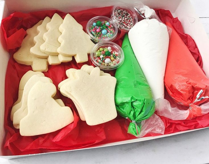 Festive Cookie Decorating Set: Colorful Icing, Assorted Cutters, and Fun Sprinkles for Holiday Creativity.