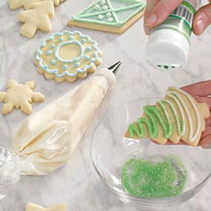 Festive Cookie Decorating Tools for Intricate Designs with Vibrant Sprinkles and Icing.