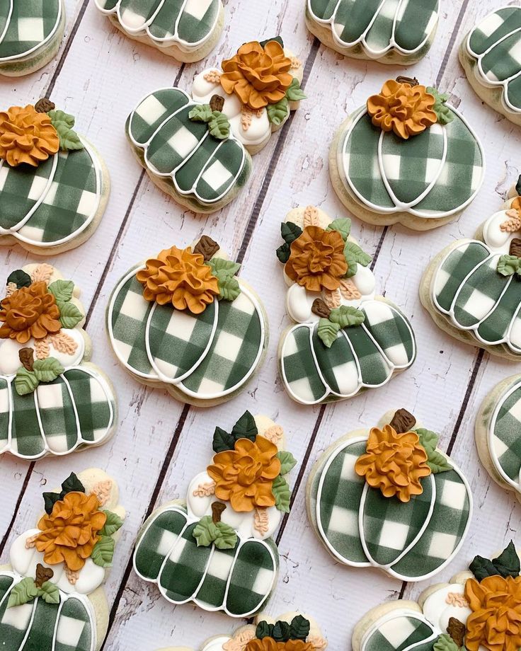 Charming Autumn-Inspired Cookies with Intricate Pumpkin Designs and Vibrant Plaid Patterns.