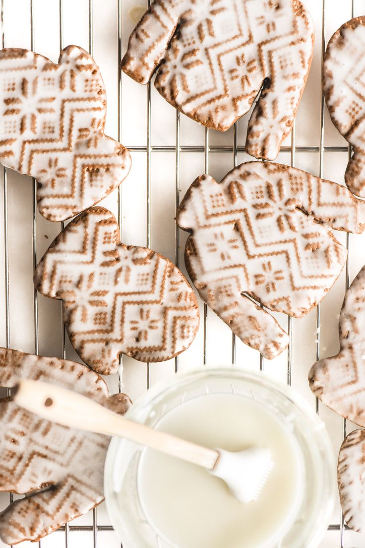 Sweater Knit-Inspired Decorative Iced Cookies on a Cooling Rack.