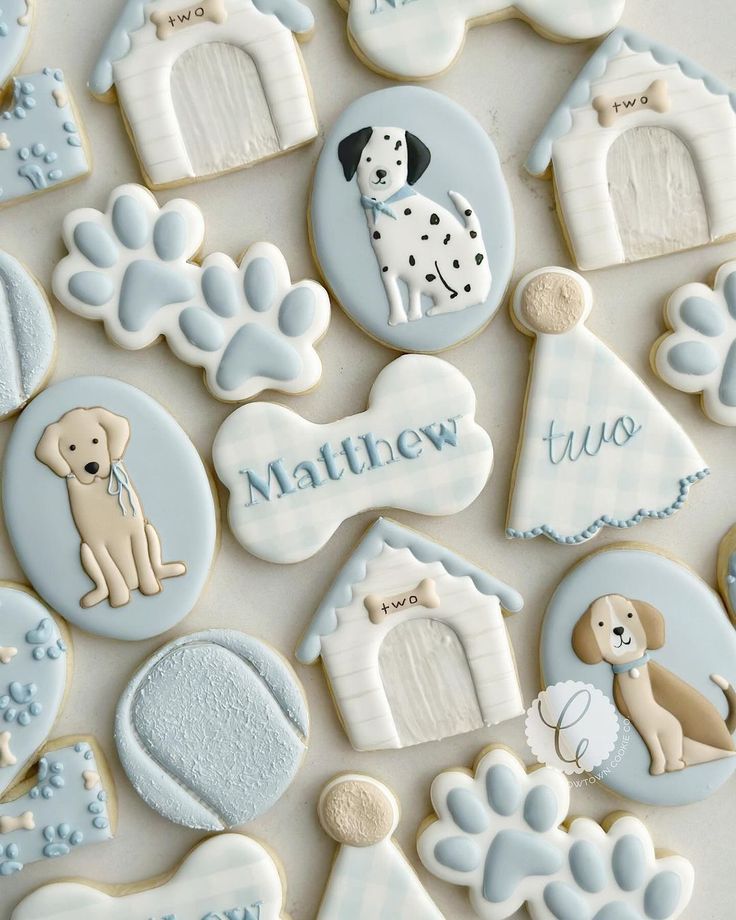 Whimsical Dog-Themed Cookie Designs in Soft Blue and White.