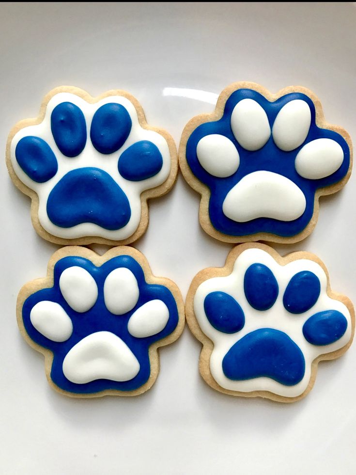 Whimsical Blue and White Paw Print Cookies: A Perfect Treat for Pet-Themed Celebrations