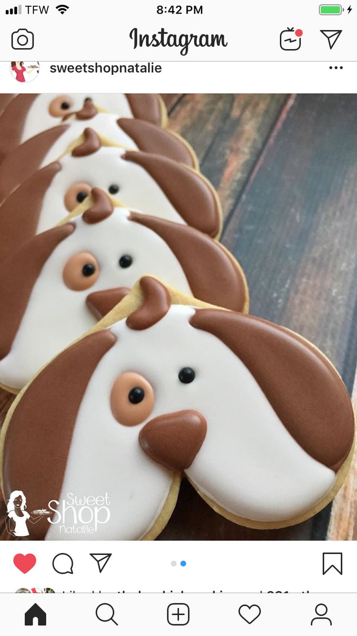 Charming Dog-Shaped Cookies with Whimsical Frosting for Celebrations.