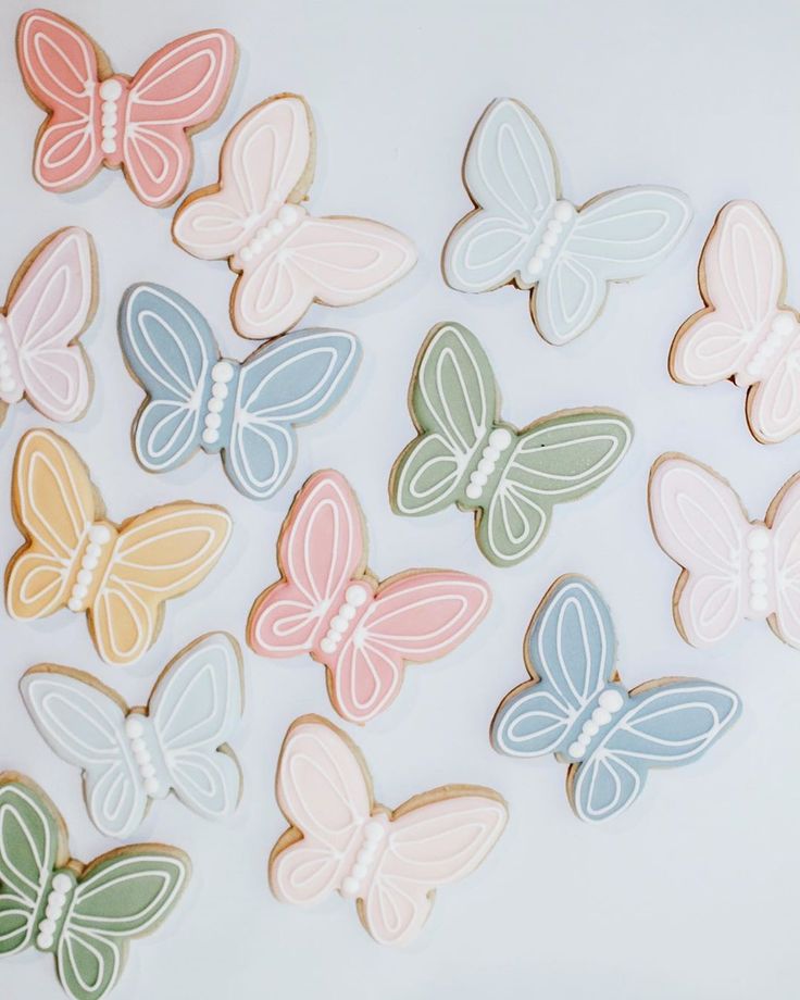 Whimsical Pastel Butterfly Designs for Cheerful Nail Art Inspiration.