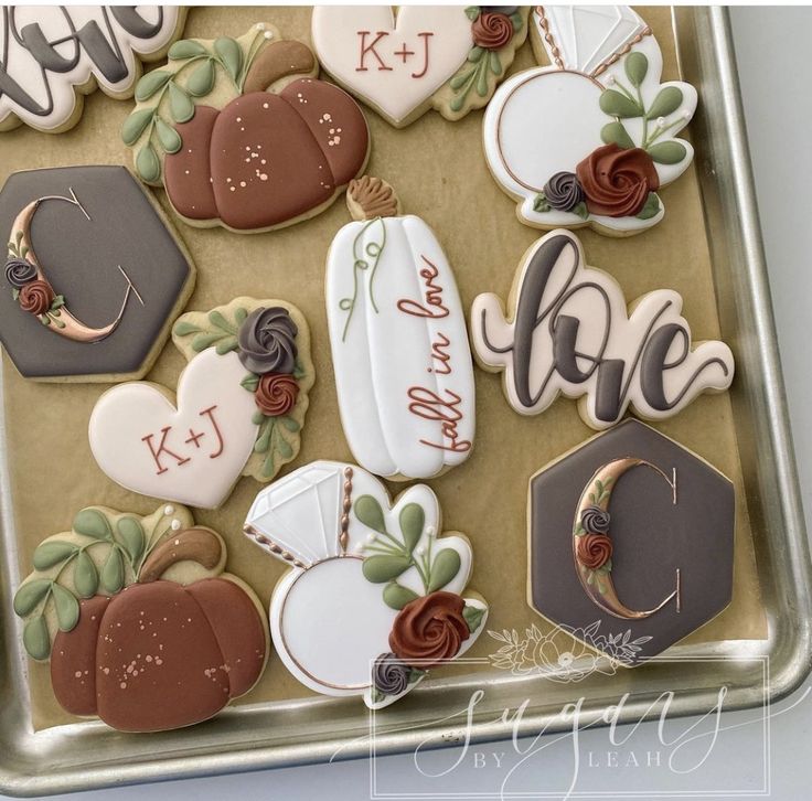 Elegant Autumn-Themed Decorative Cookies with Romantic Motifs and Soft Color Palettes.