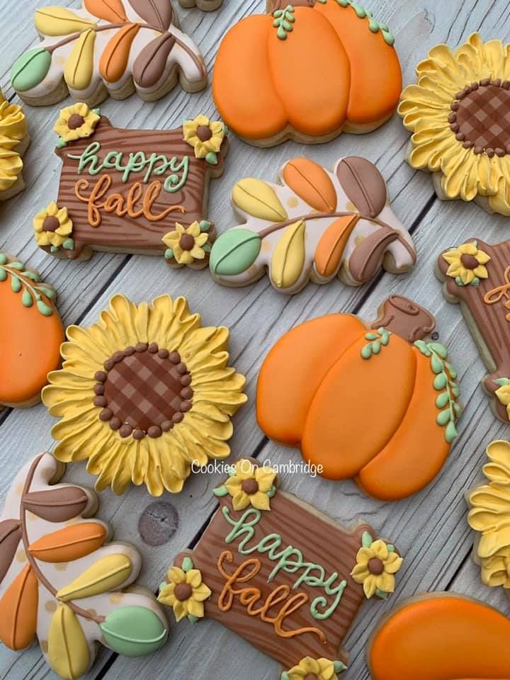 Festive Autumn Cookie Designs Featuring Vibrant Pumpkins, Sunflowers, and Intricate Leaf Shapes.