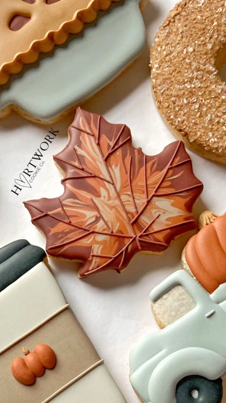 Autumn-Inspired Cookie Designs Featuring Maple Leaf and Rustic Truck Themes.