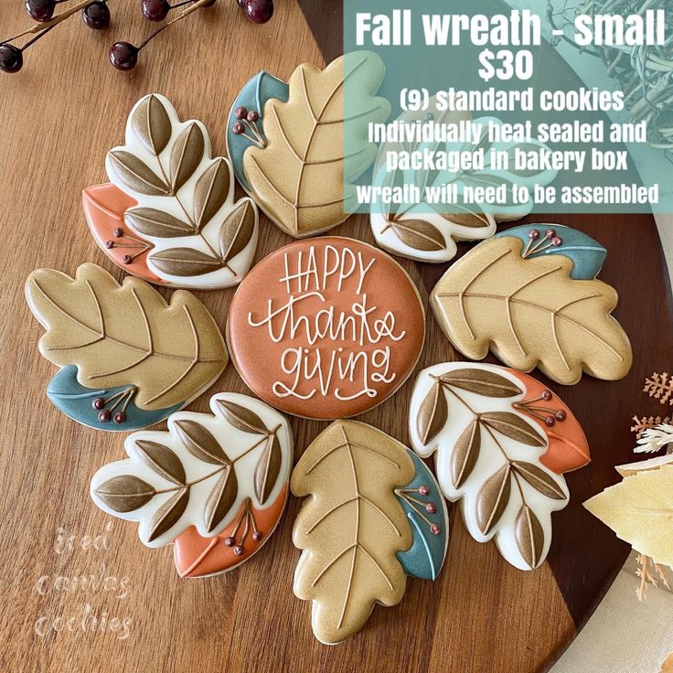 Festive Autumn Cookie Wreath Design with Intricate Leaf Decorations and Centerpiece Message.