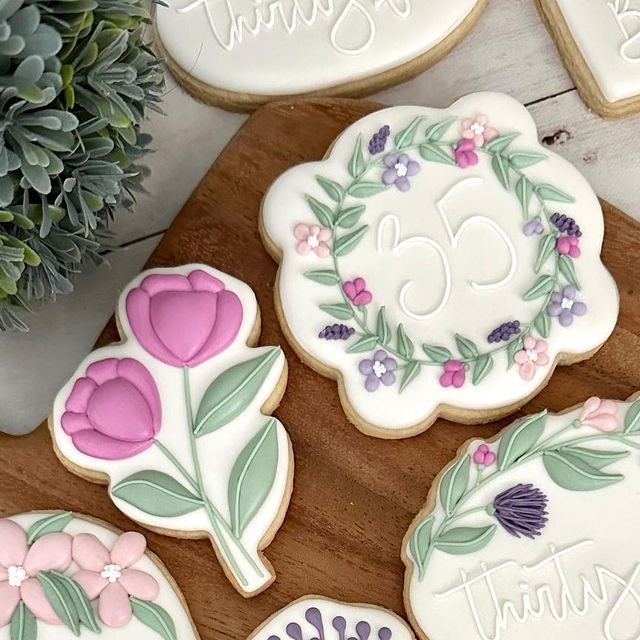 Elegant Floral-Themed Cookies with Intricate Icing Designs for Special Occasions