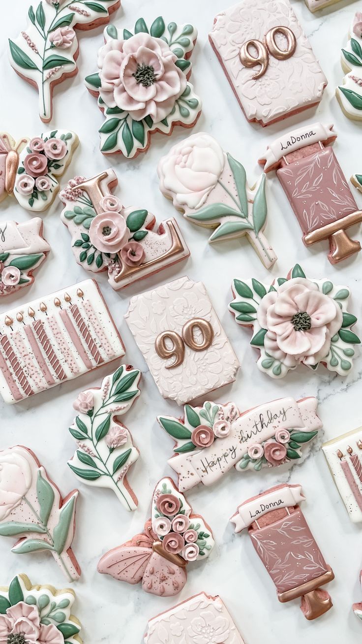 Elegant Floral Decorated Cookies in Soft Pastels for Celebratory Occasions.