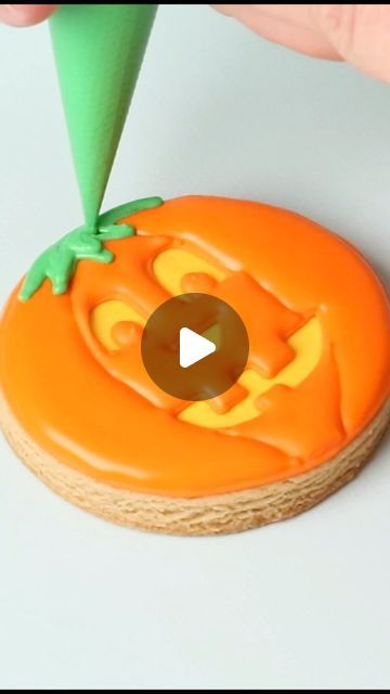 Vibrant Pumpkin-Themed Cookies: Festive Icing and Whimsical Designs for Seasonal Celebrations.