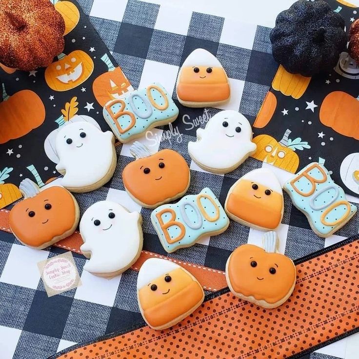 Creative Display of Colorful Halloween Cookies Featuring Friendly Ghosts, Charming Pumpkins, and Candy Corn.