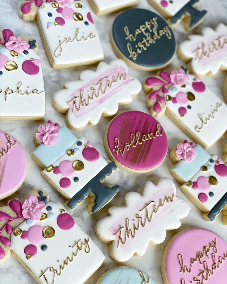 Festive Floral Cookie Designs with Personalized Lettering and Vibrant Colors