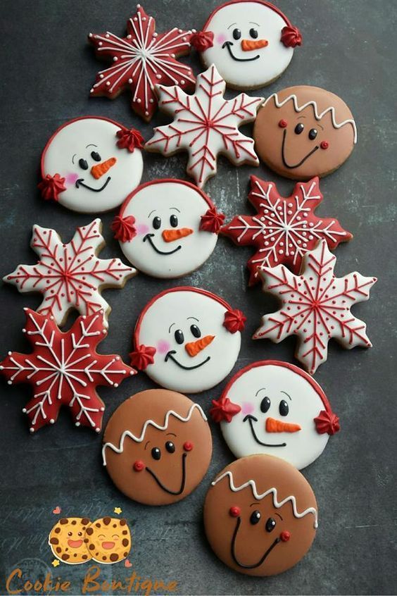 Whimsical Holiday Cookies: A Festive Display of Snowmen, Snowflakes, and Gingerbread Delights.