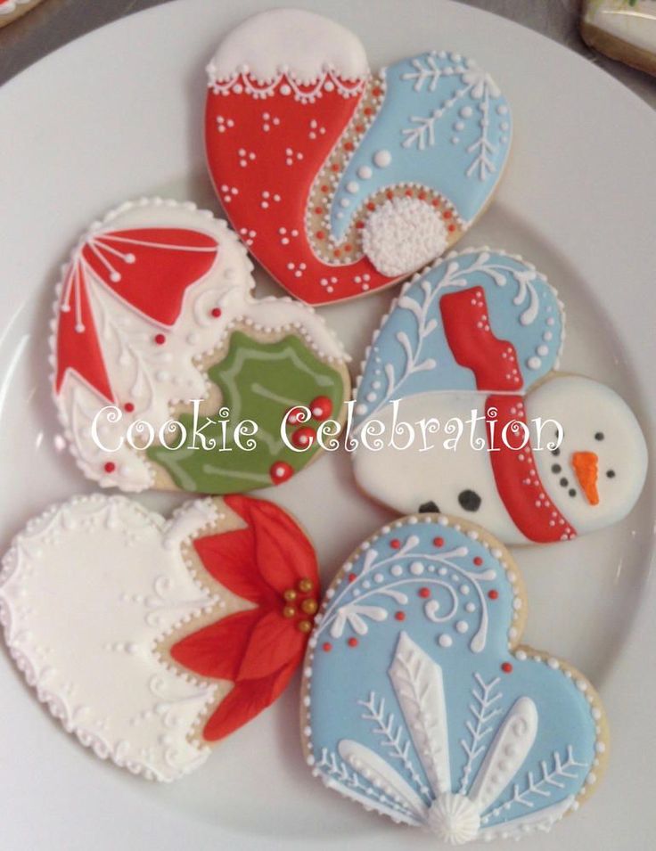 Festive Heart-Shaped Holiday Cookies in Vibrant Designs for Seasonal Celebrations