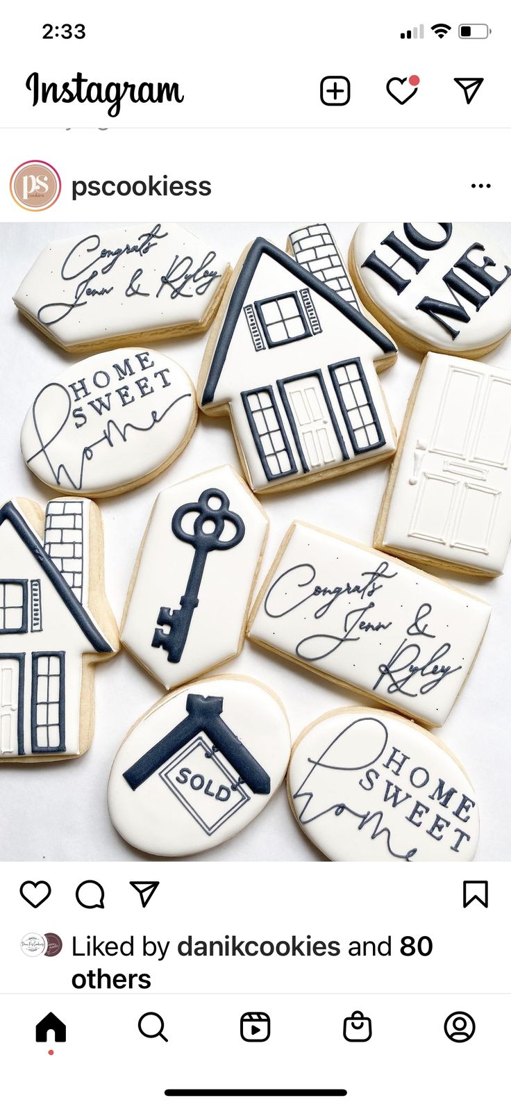 Home-themed Decorative Cookies: Elegant Designs in Black and White.