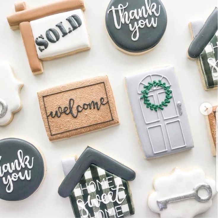 Charming Real Estate-Themed Decorative Cookies Celebrate New Beginnings with Intricate Designs.