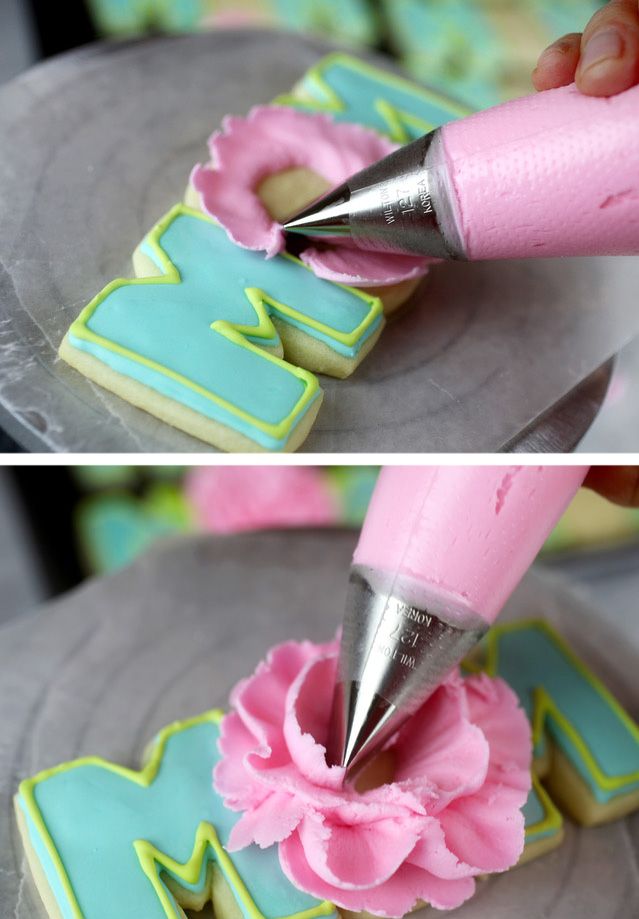 Pastel Elegance: Decorative Cookies with Floral Icing for Celebrations.