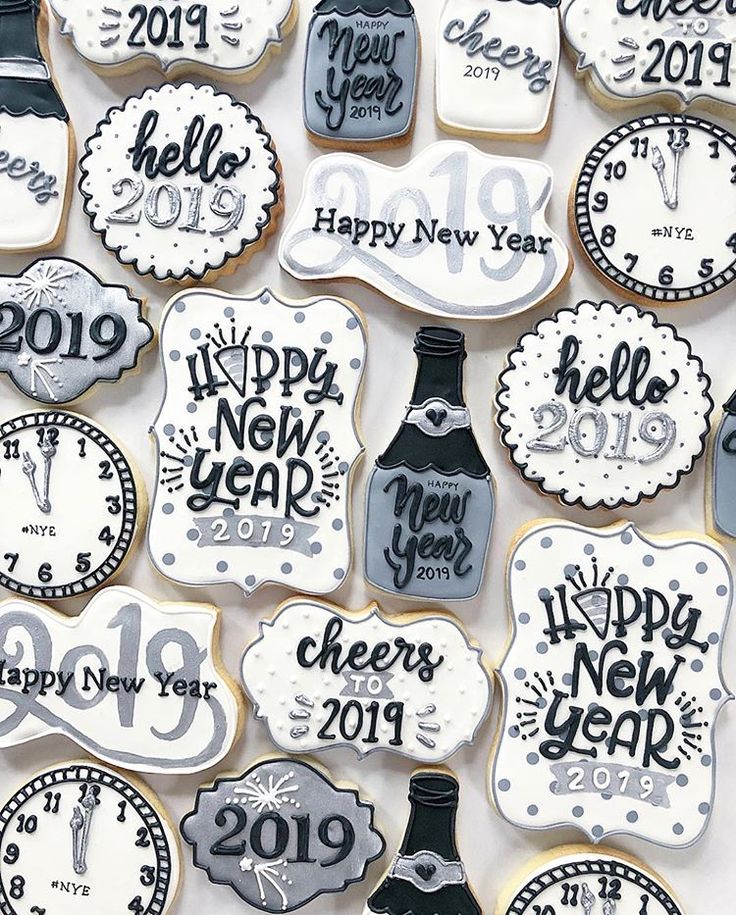 Elegant New Year's Eve Cookie Designs in Black, White, and Silver.