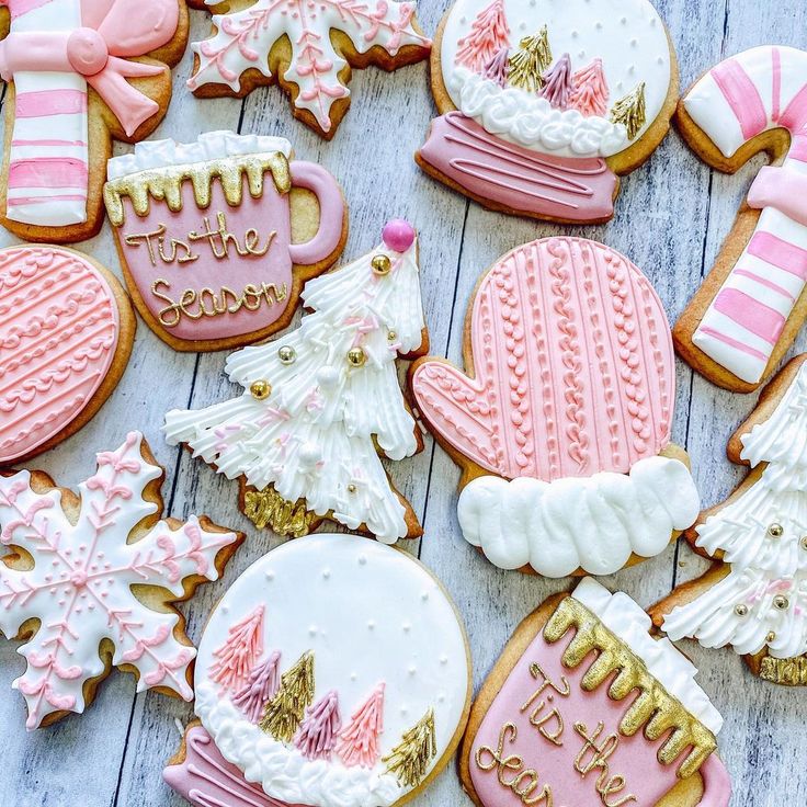 Festive Gingerbread Cookies: Charming Designs in Pink and Gold for Seasonal Celebrations.