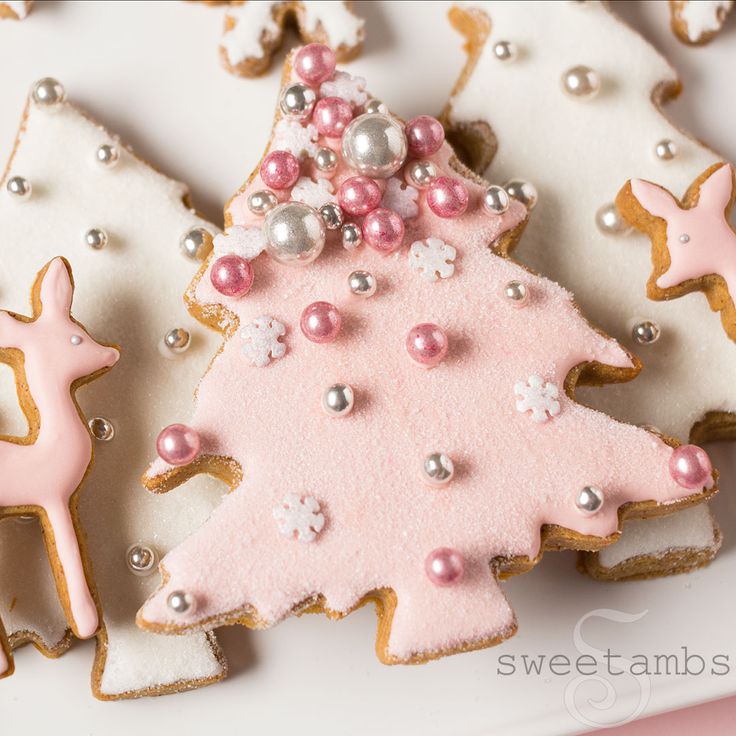 Charming Holiday Cookies: Pink and White Frosted Christmas Trees with Edible Pearls and Snowflake Accents