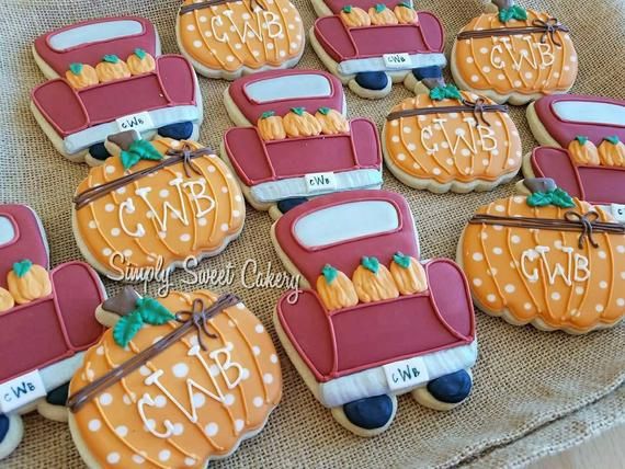 Fall-Themed Decorative Cookies Featuring Vibrant Pumpkins and Whimsical Trucks