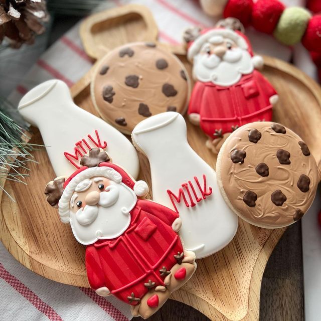 Seasonal Cookie Platter: Festively Decorated Santa Cookies with Chocolate Chip Accompaniments.