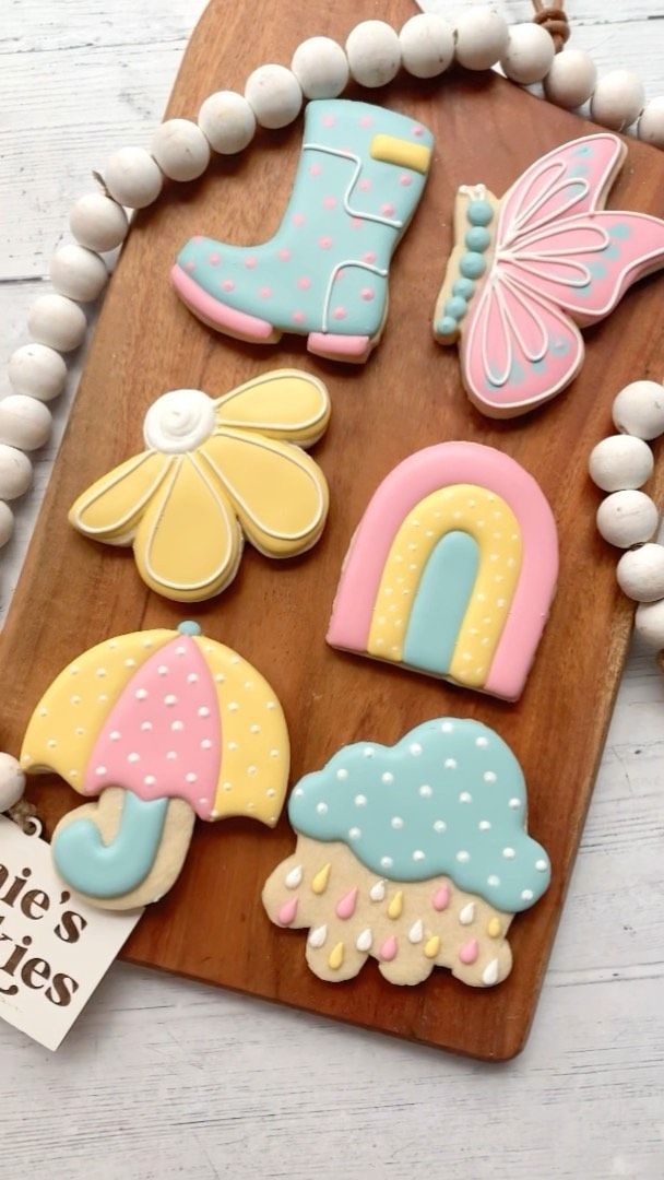 Whimsical Spring-Themed Cookies: Bright Designs of Rain Boots, Butterflies, and Pastel Rainbows