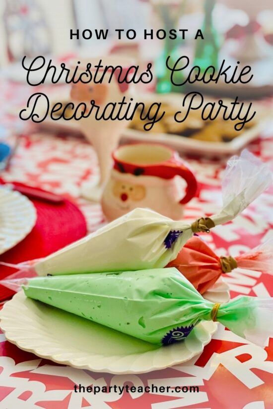 Festive Cookie Decorating Setup with Colorful Icing Bags and Christmas Decor.