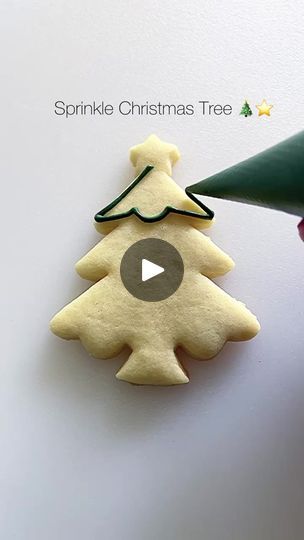 Festively Decorated Christmas Tree Cookie with Intricate Piping and Bright Sprinkles