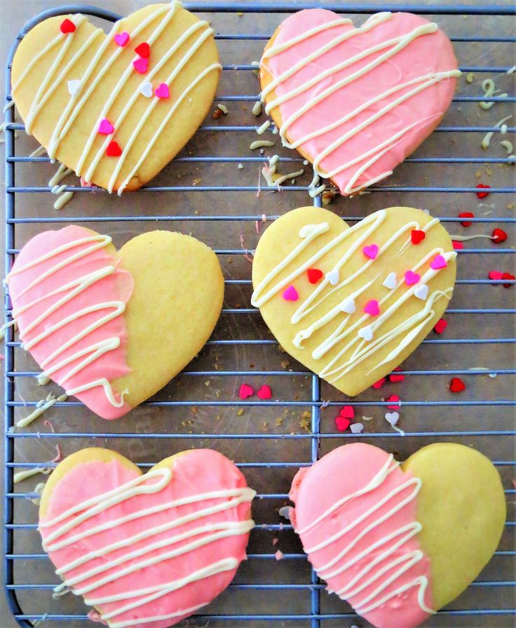 Vibrantly Designed Heart-Shaped Cookies: A Festive Treat for Sweet Tooth Lovers.