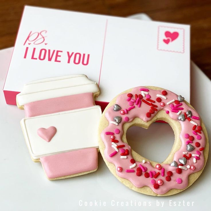 Charming Pink Donut and Coffee Cup Cookies: A Sweet Treat with Colorful Sprinkles.