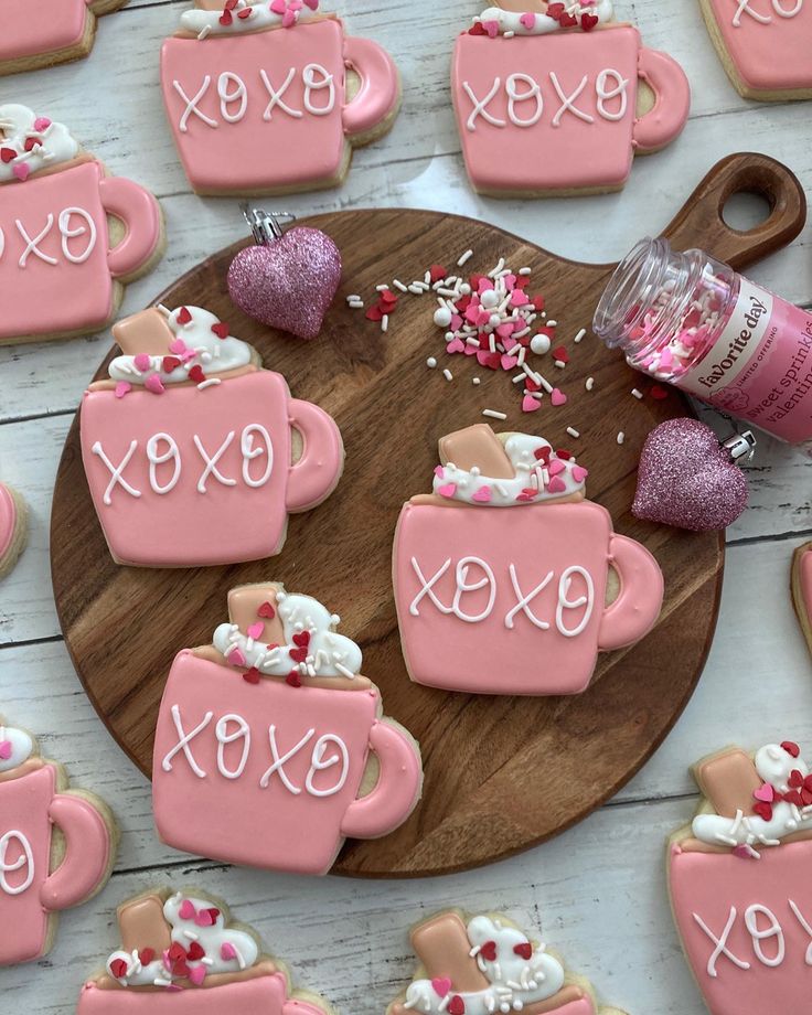 Charming Mug-Shaped Decorative Cookies with Frosty Icing and Festive Designs.