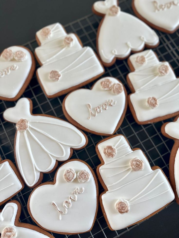 Elegant Wedding-Themed Decorative Cookies with Intricate Icing Details.