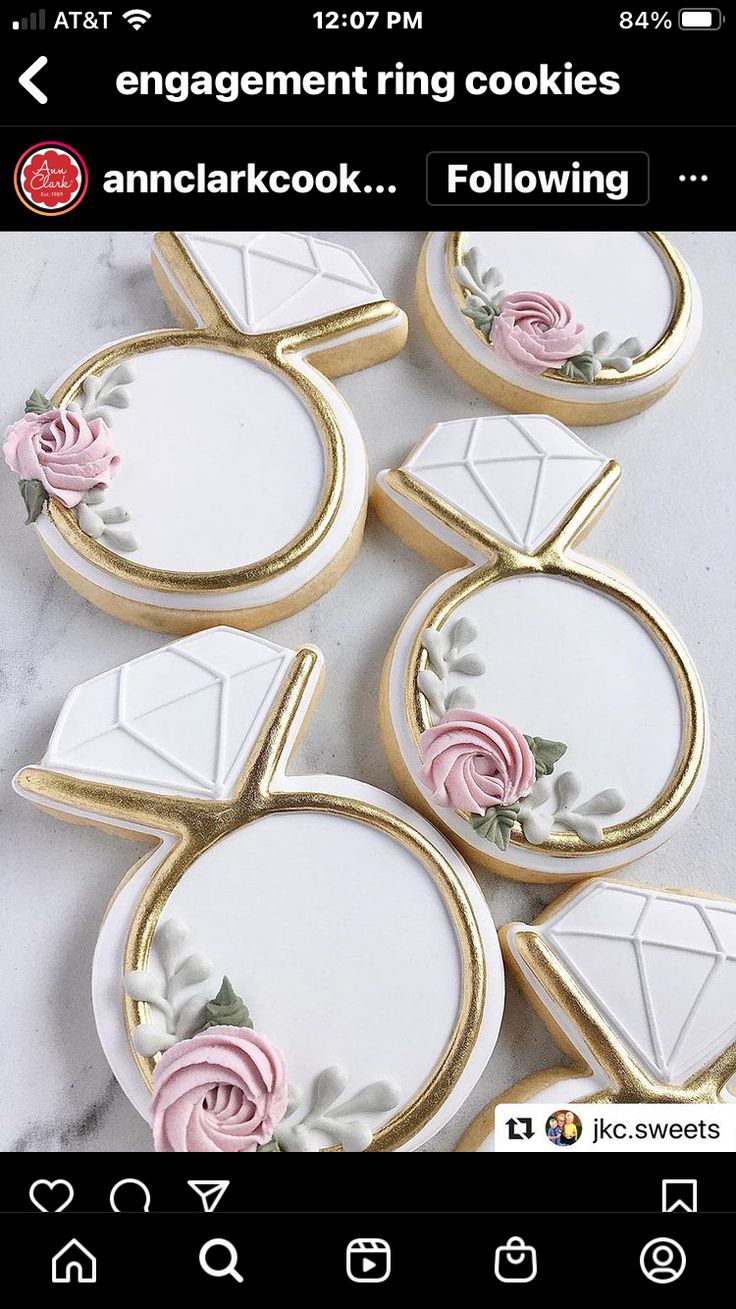 Elegantly Whimsical Engagement Ring Cookies Adorned with Roses and Gold Accents.