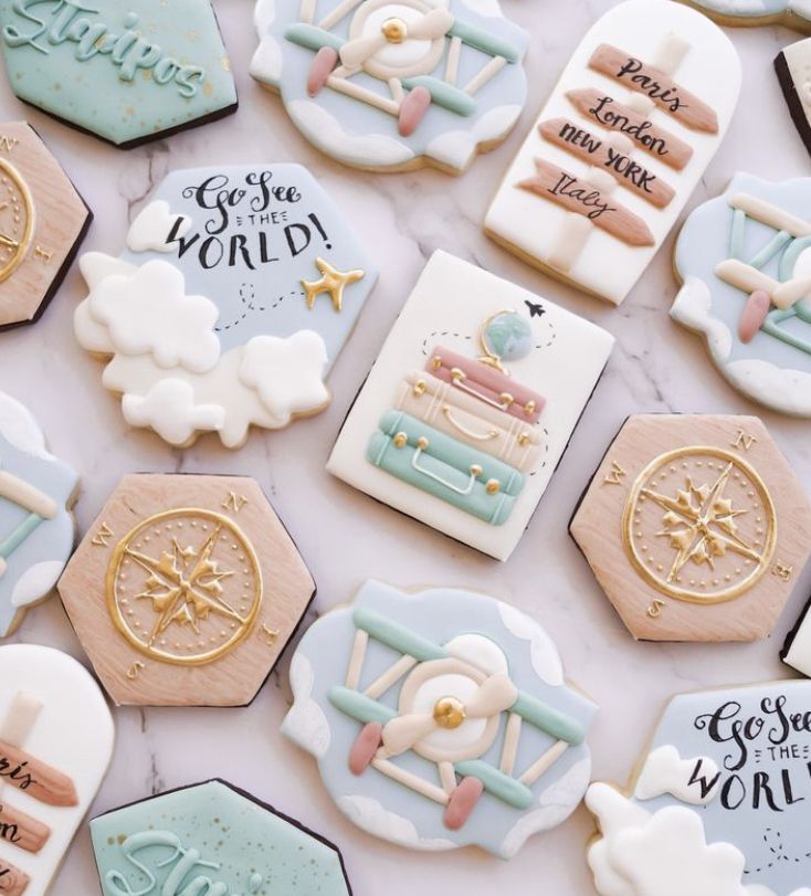 Whimsical Travel-Themed Cookie Designs with Airplanes, Suitcases, and Decorative Elements