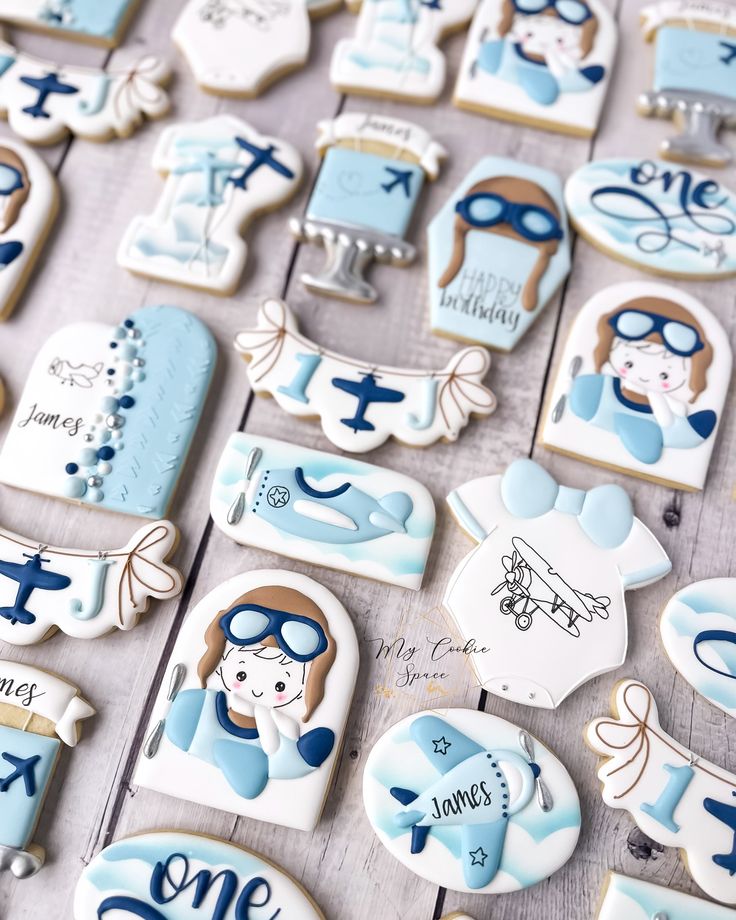 Aviation-Themed Whimsical Cookies: Delightful Pastel Designs for Birthday Celebrations.