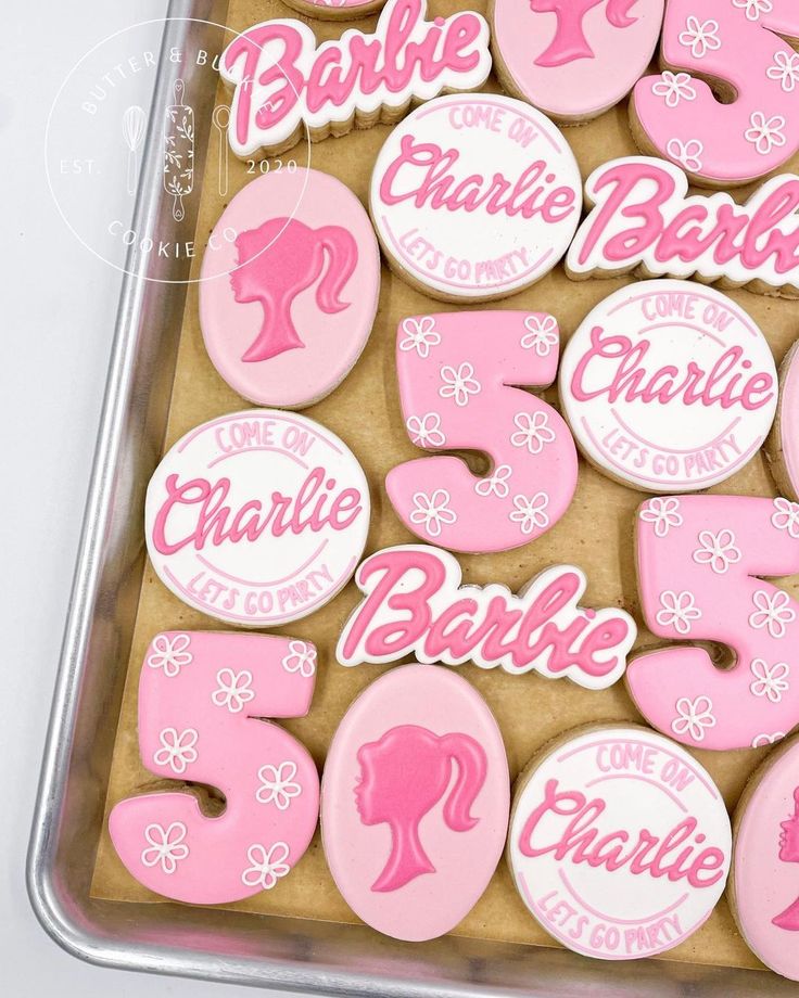 Playful Pink-Themed Cookies with Chic Designs and Floral Accents for Festive Celebrations.