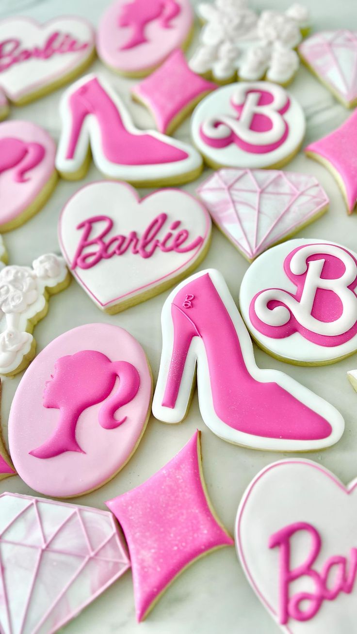 Whimsical Fashion-Inspired Decorative Cookies in Vibrant Pink Hues.