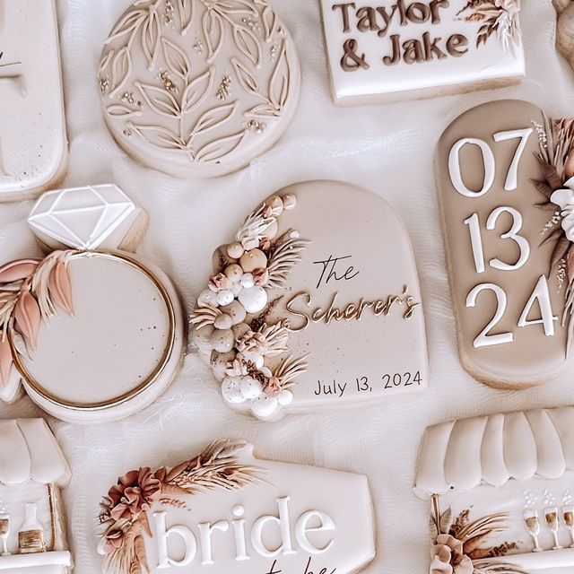 Sophisticated Wedding-themed Clay Decorations in Soft Neutrals for Romantic Celebrations.