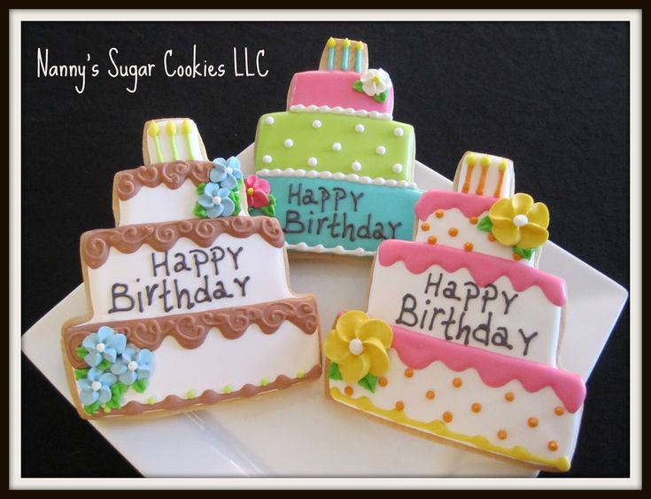 Whimsical Birthday Cake Cookies with Intricate Icing Designs for Festive Celebrations.