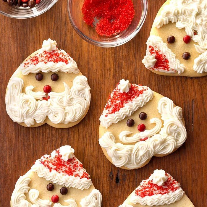 Cheerful Santa Face Cookies: Whimsical Icing and Colorful Details for Festive Celebrations.