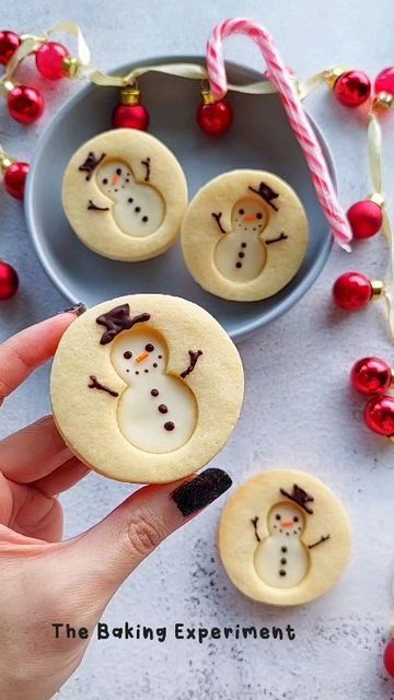 Cheerful Festive Snowman Cookies Enhance Holiday Spirit with Whimsical Designs.