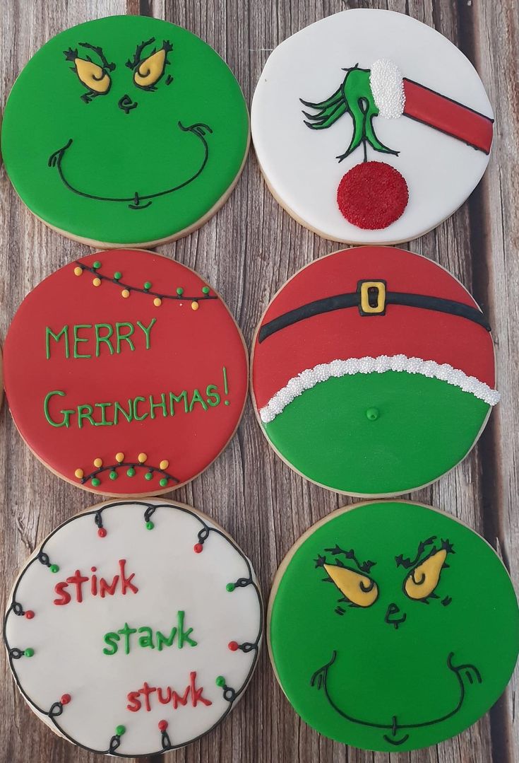 Whimsical Festive Cookie Designs Featuring Playful Grinch Illustrations and Bright Holiday Colors.