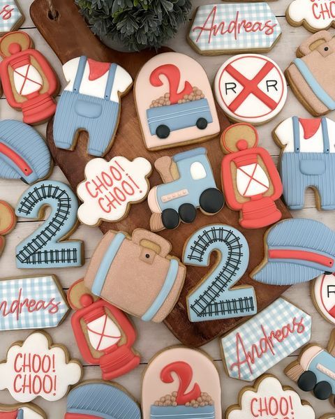 Whimsical Train-Themed Cookie Designs for a Festive Children's Celebration.