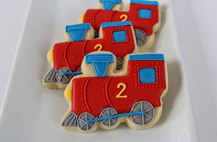 Whimsical Train-Shaped Cookies with Vibrant Icing for Celebrations