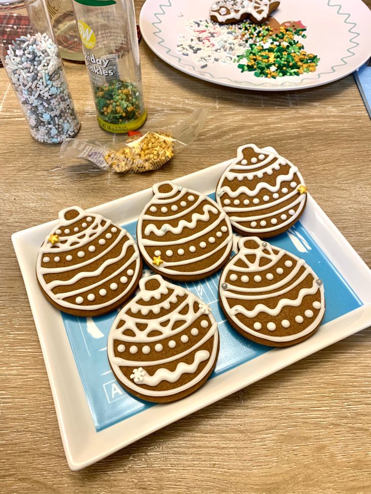 Festive Gingerbread Ornament Cookies Decorated with Intricate Icing and Colorful Sprinkles.